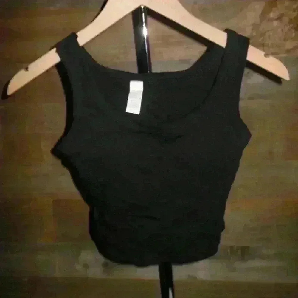 Black crop top w/ slits on sides has padding inside  - OS